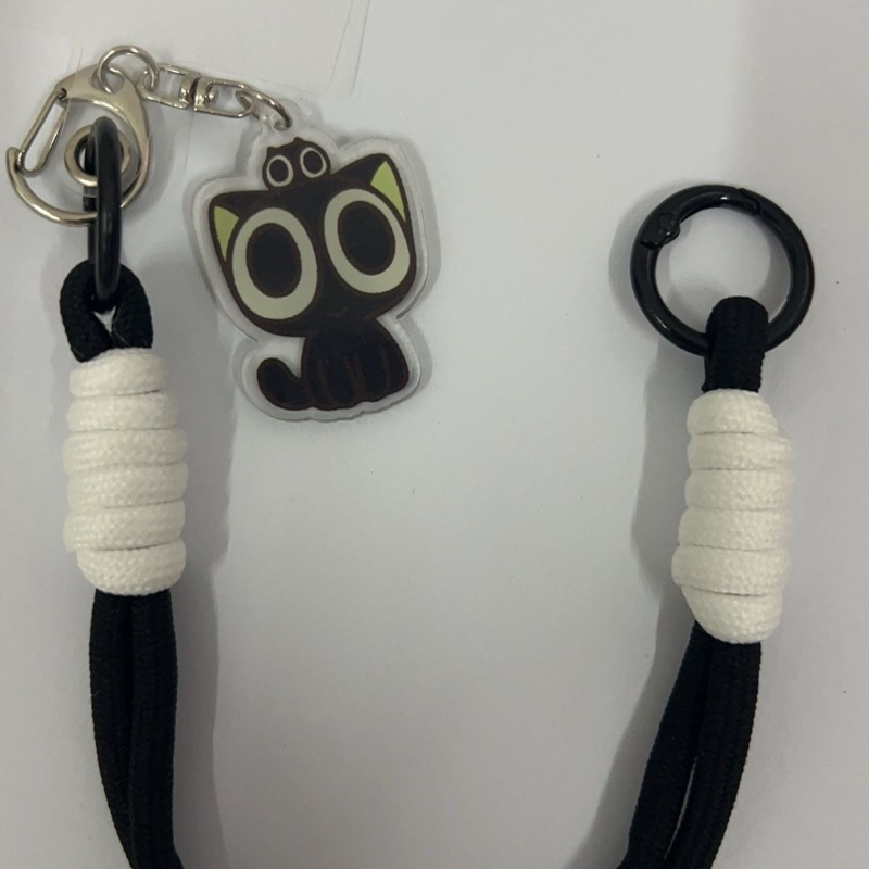 スタイリッシュな黒猫をモチーフにした盗難防止・落下防止機能付 - Phone Accessories In China のレビューと価格